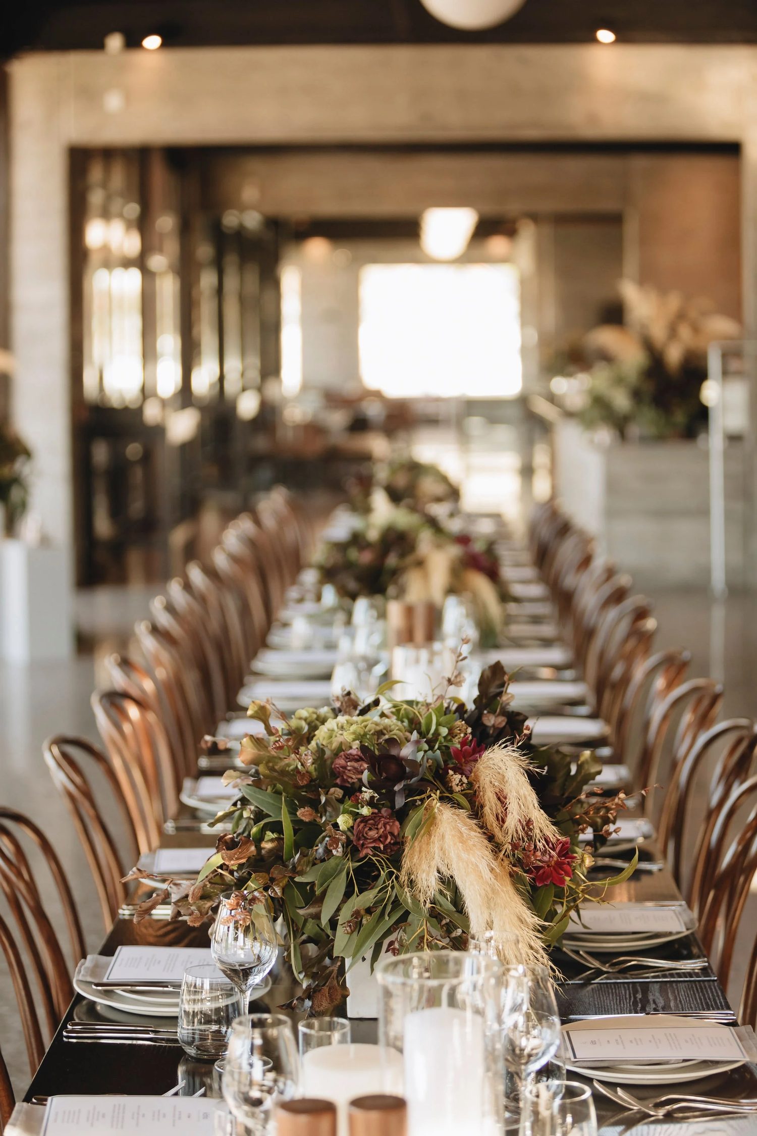 A long editorial press lunch table styled for the Kotia campaign