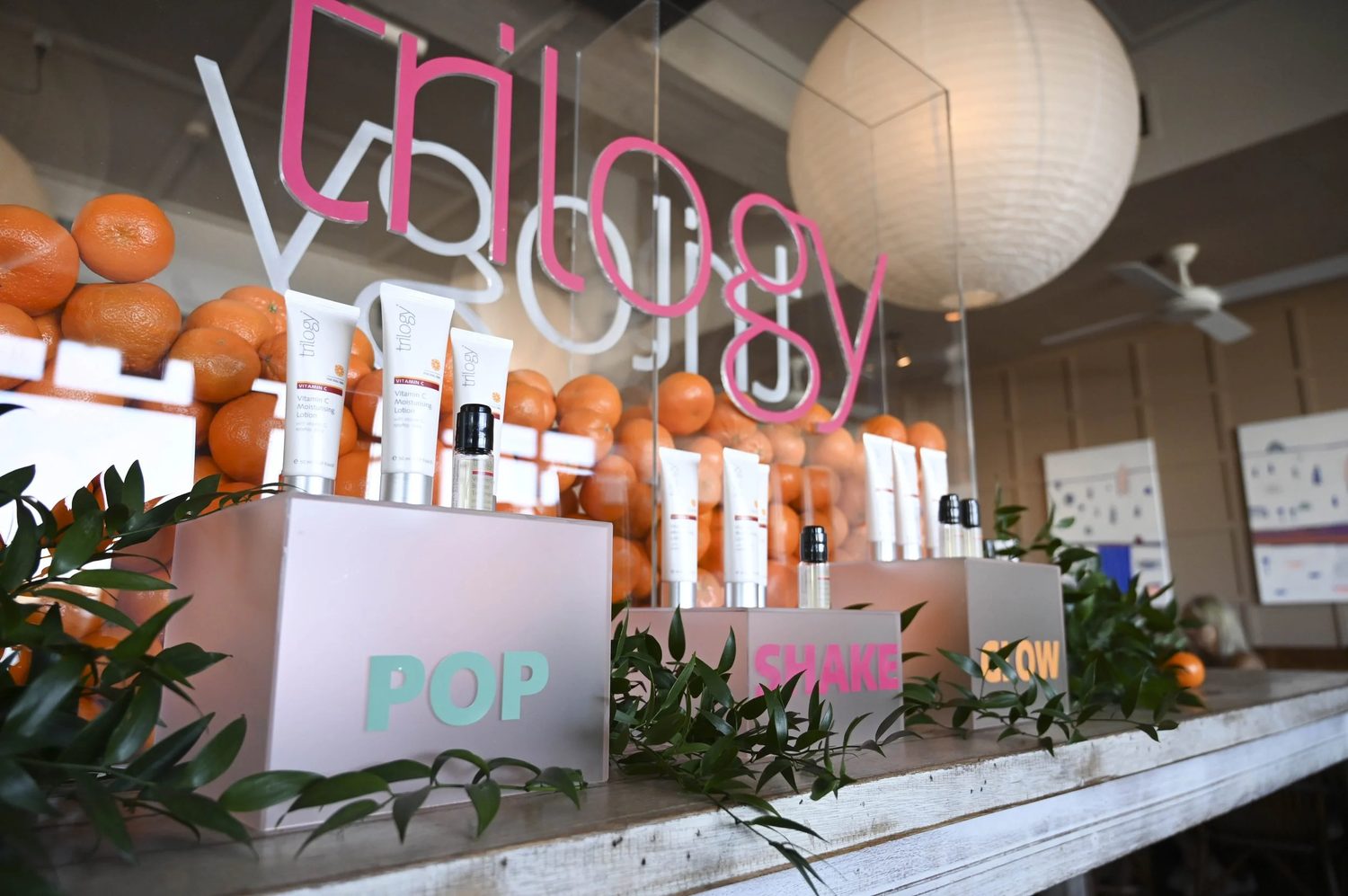 Trilogy pop activation with neon signage and styled product